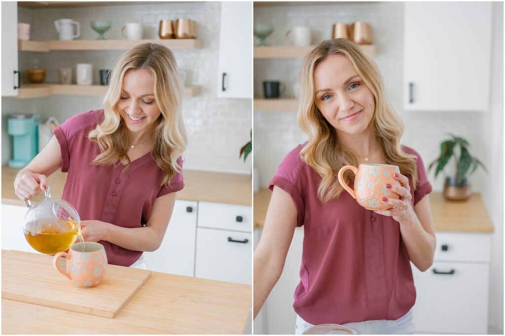 woman pouring and holding a tea mug in a kitchen and smiling