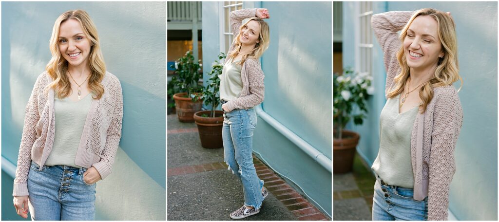 woman in front of teal blue wall smiling and laughing by Krista Marie Photography, a Bay Area brand photographer